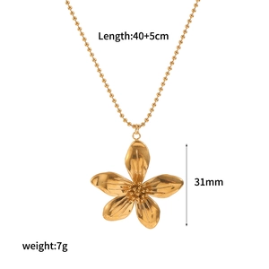 Detailed view of golden flower pendant necklace with dimensions and weight specifications