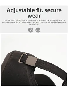 Detail of adjustable metal buckle and textured fabric on the dark grey baseball cap