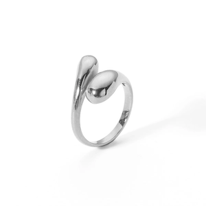 Macro detail of silver drop-shaped ring with polished organic asymmetrical design