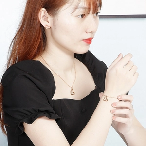 Elegant rose gold heart jewelry set including necklace, bracelet and stud earrings for women