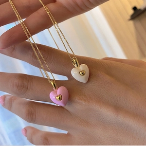 French vintage metal heart pendant necklaces in pink and white enamel with gold chains