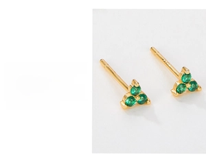 Detailed macro view of triple green zircon stones in S925 sterling silver flower earrings