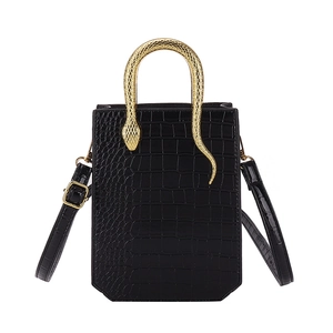 Black crocodile embossed tote bag with unique gold snake handle and adjustable strap