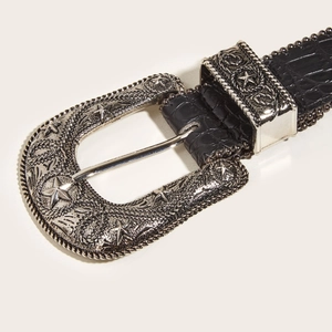 Western style black faux crocodile leather belt with decorative silver star buckle