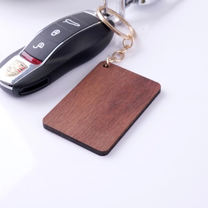 Custom rectangle wood keychain with gold ring and natural grain for hotel room tags