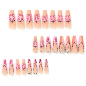 Faux ongles ballerine rose mat Halloween avec pois citrouille et strass brillants
