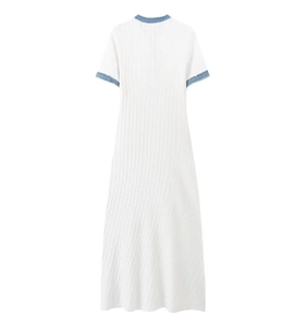 Detail of white ribbed knit dress with light blue denim patchwork on the neckline and sleeves