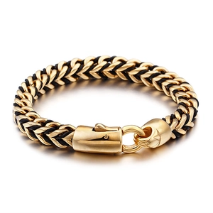 Men's retro black braided leather and 18K gold stainless steel bracelet on white background