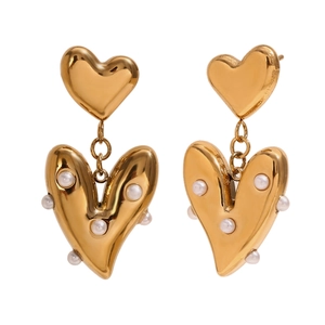 18K gold plated stainless steel heart earrings with pearl accents on a white background