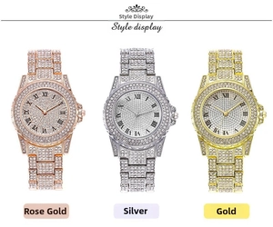 Detailansicht luxuriöser Strassuhren in Roségold, Silber und Gold für Damen