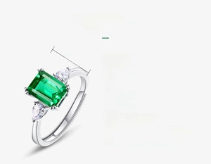 Macro shot of 1.23ct emerald cut lab-grown emerald ring with S925 silver specs