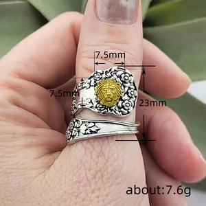 Vintage lion head ring for men in silver and gold tone featuring weight and size details