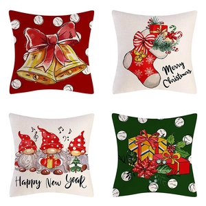Detail of four Christmas pillow covers with linen texture featuring gnomes and bells