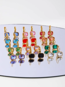 Detail showing various colors of rectangular zircon earrings with gold leverback closure