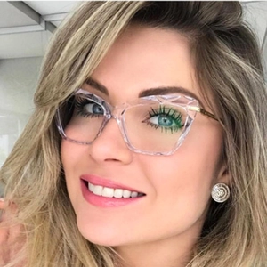 Women's cat eye glasses featuring clear diamond-cut frames and gold metal temples
