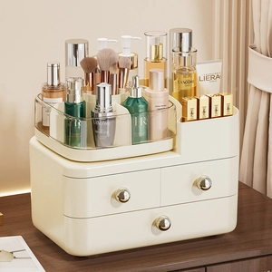 Three-tier cream cosmetic storage box with gold handles and large capacity drawers