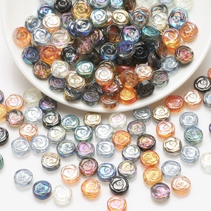 Close-up of 10mm iridescent glass rose beads in assorted metallic colors for DIY jewelry