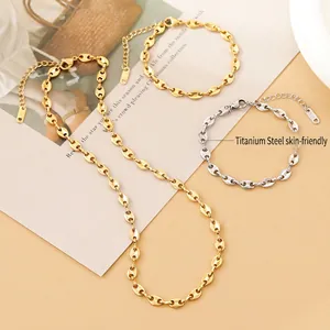 Parure bijoux en acier titane plaqué or 18K avec collier et bracelet grain de café