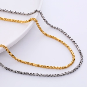 3mm stainless steel wheat chains in gold and silver finishes on white background
