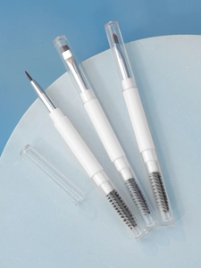 Dual-ended makeup brush set with spiral spoolie and flat fiber bristles on blue stand