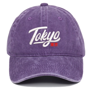 Close-up of vintage washed purple baseball cap with 3D Tokyo embroidery and red Kanji text