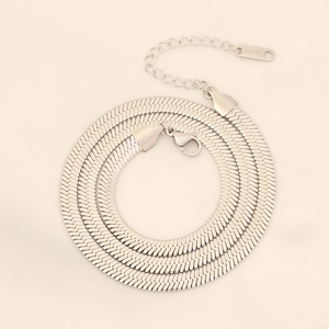 Detail of silver stainless steel flat snake chain with lobster clasp and extender
