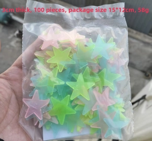 Detail of 100pcs 3cm colorful glow stars in a transparent bag for wall decoration