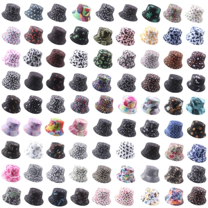 Grid layout showing multiple tie-dye, floral, and 3D print reversible bucket hats for sun protection