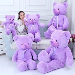 Detail showing five different sizes of purple lavender teddy bears with ribbon bows