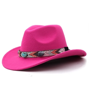 Detail of western wool fedora featuring turquoise beadwork and ethnic woven hat band