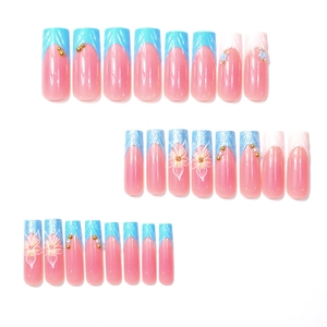3D French floral press-on nails with pink gradient and blue tips, featuring pearls