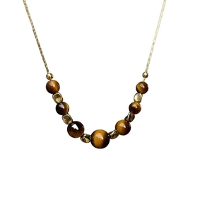 Adjustable 18K gold plated necklace featuring natural tiger eye beads and golden spacers