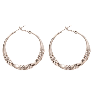 Silver geometric twisted hoop earrings with sparkling crystal pavé for women