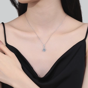 Elegant 925 sterling silver teardrop necklace with a brilliant round moissanite pendant
