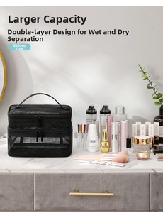 Close-up of double-layer black mesh toiletry bag with dry-wet separation on marble surface