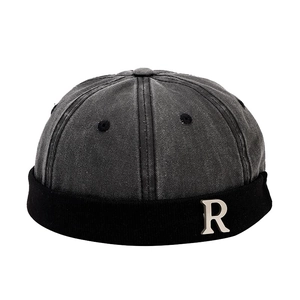 Vintage dark grey washed canvas miki hat with silver metal R logo in street style