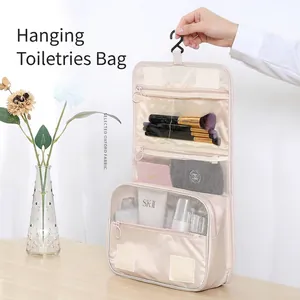 Hanging toiletry bag with large capacity dry and wet separation for travel in beige gold