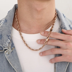 Hip hop rose gold stainless steel twist rope chain necklace worn by a fashion model