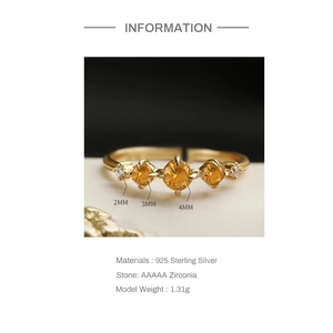 Macro detail of gold S925 silver ring featuring size specifications and AAAAA zircon settings