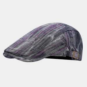 Detail shot of vintage striped ivy cap showing textured purple fabric and metal buckle