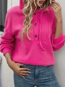 Detail of rose red ribbed knit hoodie with decorative buttons and matching drawstrings
