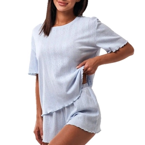 Women's light blue ribbed loungewear set featuring short sleeve top and elastic shorts