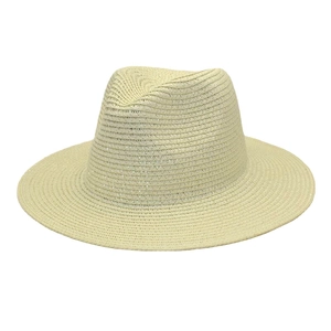 Detail shot of the woven mesh texture on a light beige straw panama hat