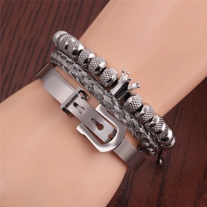 Three-piece silver stainless steel bracelet set with crown charm and twisted open cuff