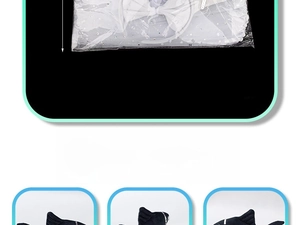 Detailed view of plush shark tail headband and mesh bow hair accessories for Halloween