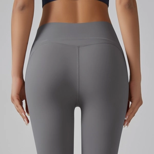 Detailed back view of high-waist yoga leggings showing butt-lifting seam and matte fabric