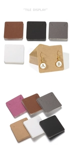 Macro view of multi-color paper earring display cards with hanging holes and jewelry
