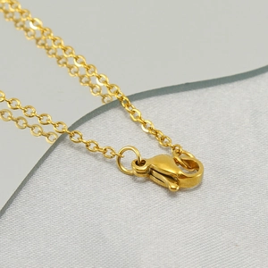 Golden stainless steel necklace chain featuring a classic lobster clasp design