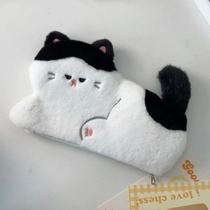 Close-up of cat plush pencil case with embroidered paw detail and soft fabric texture