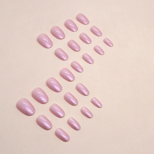 Coffret de 24 faux ongles ovales courts rose aurore avec fini nacré délicat